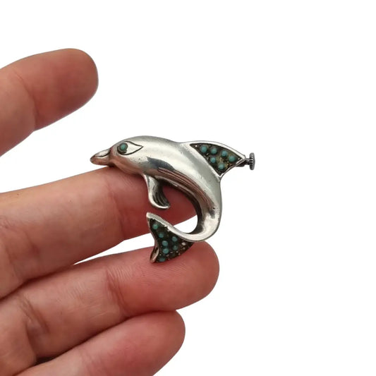 Broche de delfín plata con incrustaciones piedras azules Joyería marina