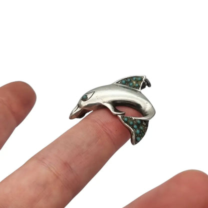 Broche de delfín plata con incrustaciones piedras azules Joyería marina