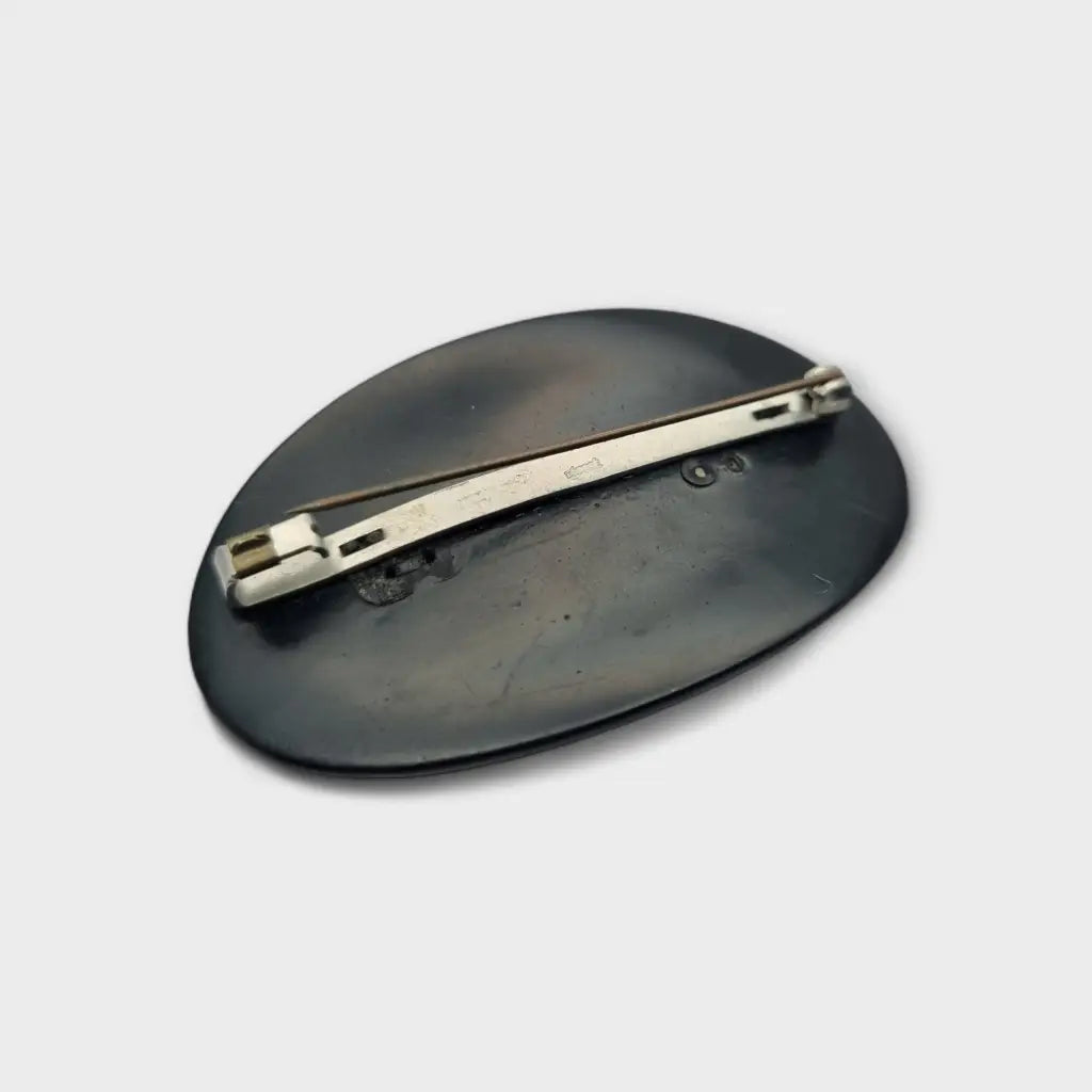 Broche de ebonita con motivos florales grabados - Joyería luto victoriana