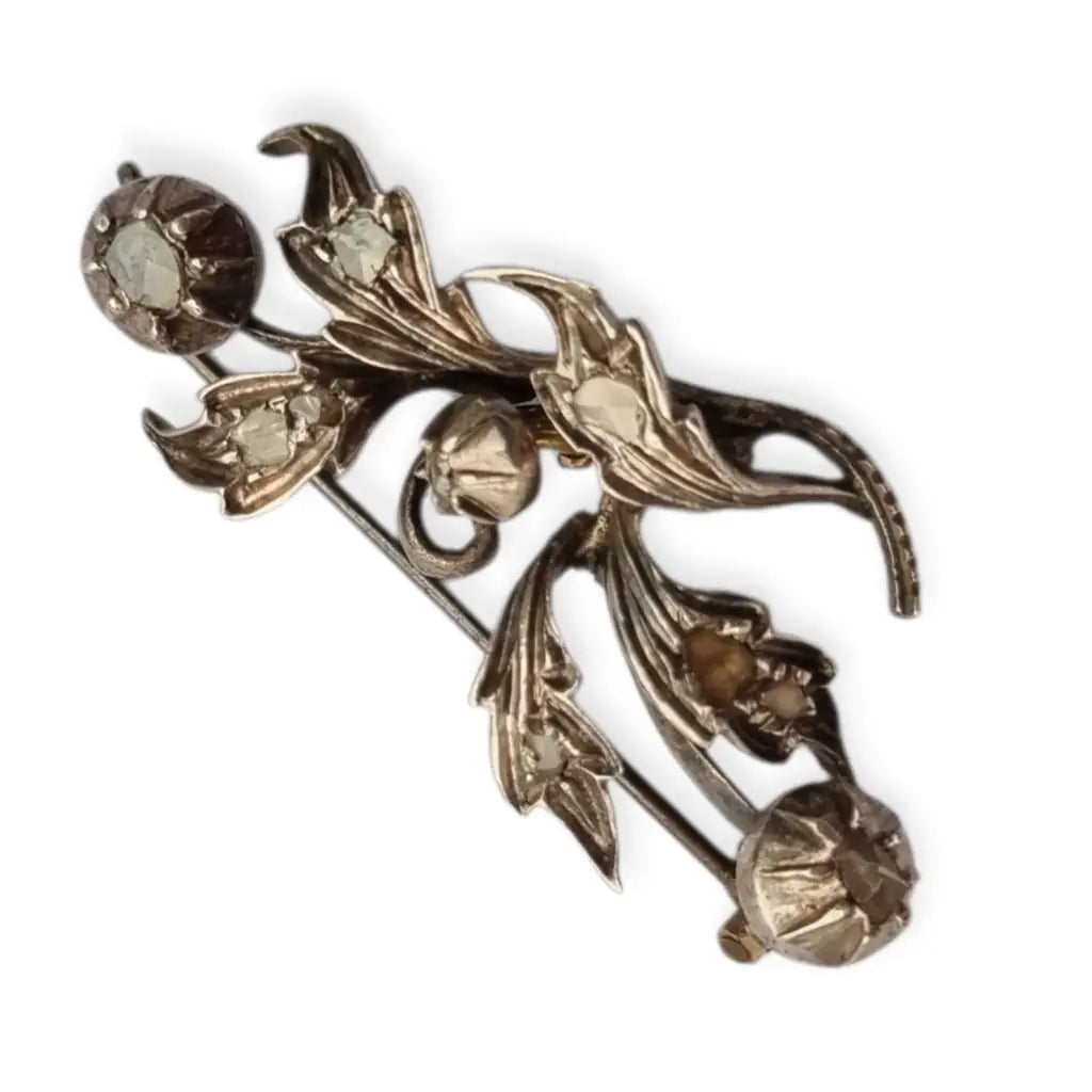 Broche floral victoriano antiguo en plata con diamantes talla antigua