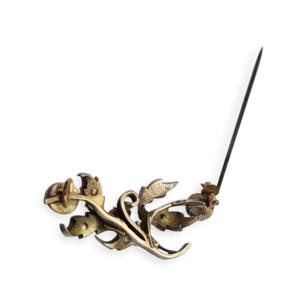 Broche floral victoriano antiguo en plata con diamantes talla antigua
