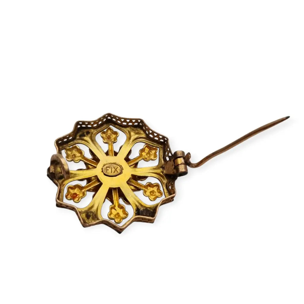 Broche francés vintage de oro FIX con diseño floral calado y una perla central