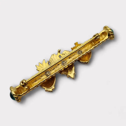 Broche de fruta con diamantes imitación dorados pinchos verdes