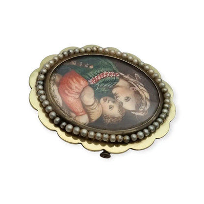 Broche ovalado de bronce y perla con una miniatura la Virgen el Niño