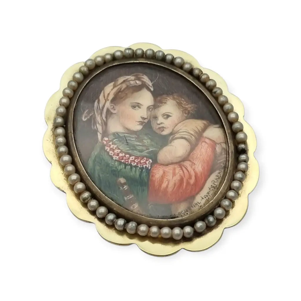 Broche ovalado de bronce y perla con una miniatura la Virgen el Niño