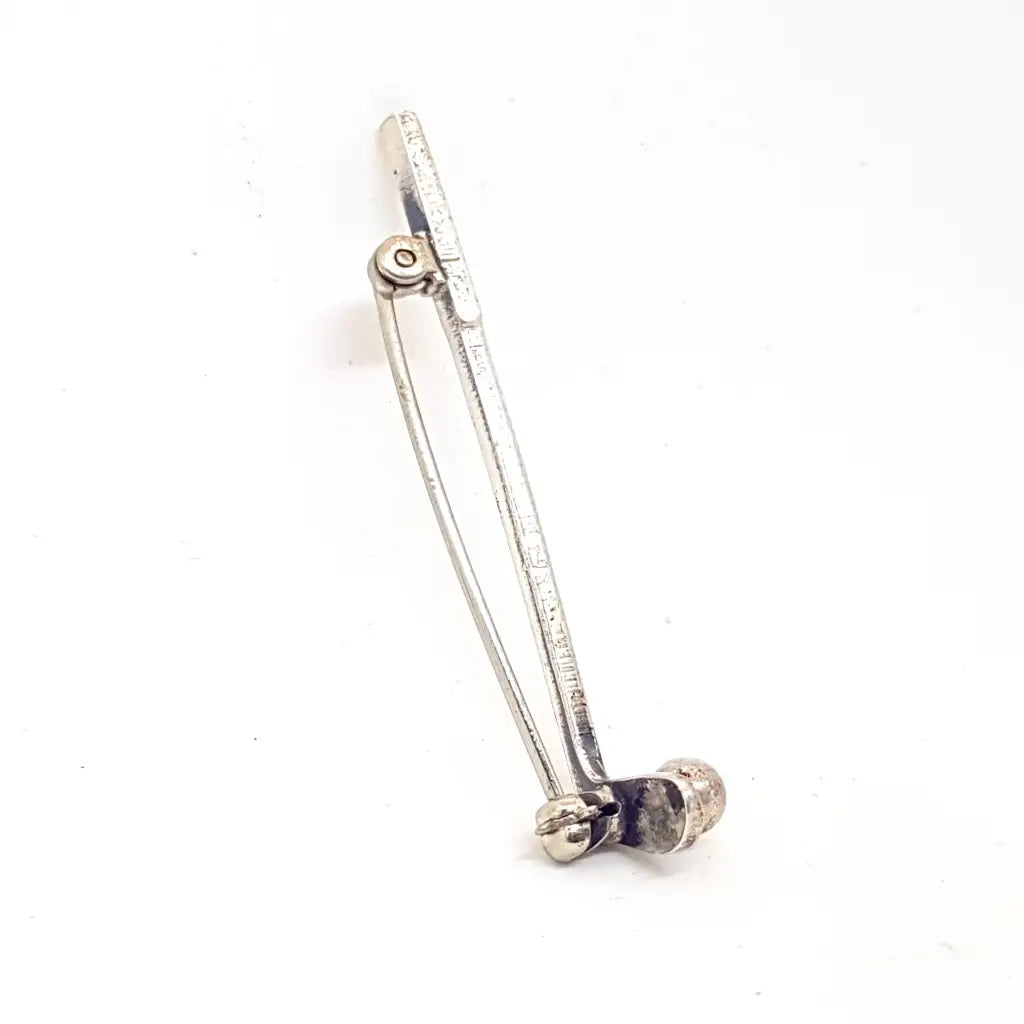 Broche palo de golf plata circa 1980 joyería antigua y vintage.