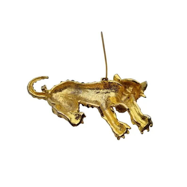 Broche pantera dorada con pedrería verde y esmalte negro para amantes