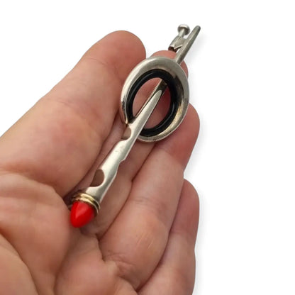 Broche de plata Puig Doria Barcelona alfiler capa con detalles en negro