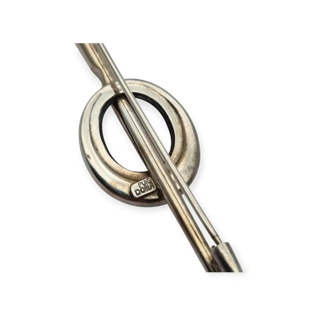 Broche de plata Puig Doria Barcelona alfiler capa con detalles en negro