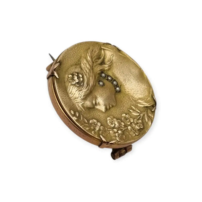 Broche redondo dorado art nouveau con perfil femenino y perlas joyas antiguas