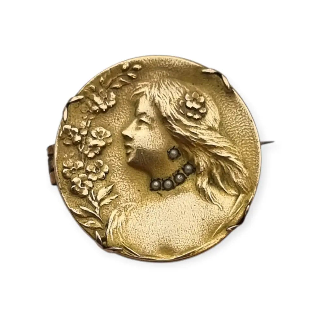 Broche redondo dorado art nouveau con perfil femenino y perlas joyas antiguas
