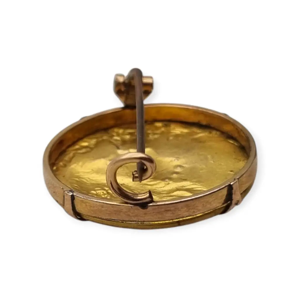 Broche redondo dorado art nouveau con perfil femenino y perlas joyas antiguas