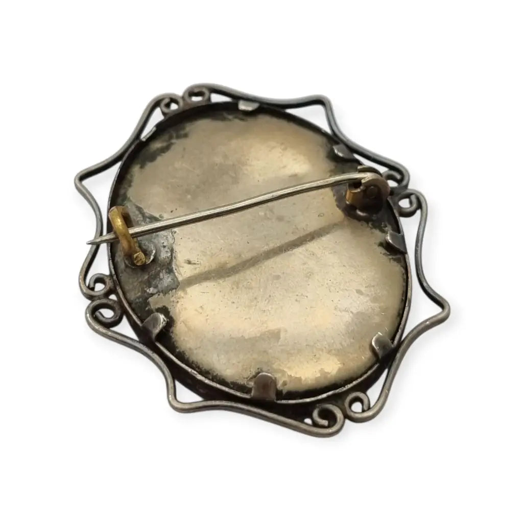 Broche Victoriano antiguo con retrato fotográfico ovalado en marco metálico