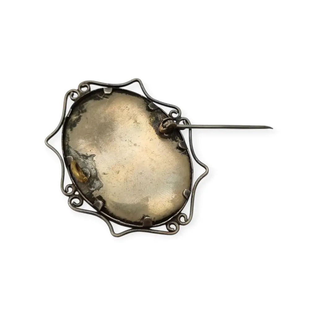 Broche Victoriano antiguo con retrato fotográfico ovalado en marco metálico