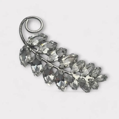 Broche vintage Carl Art de plata ley 925 con cristales y diseño hojas.