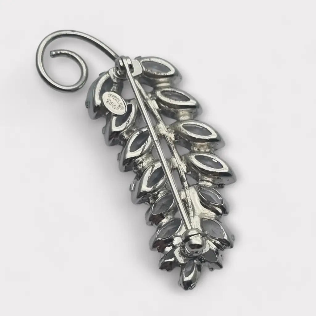 Broche vintage Carl Art de plata ley 925 con cristales y diseño hojas.