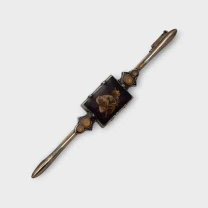 Broche Vintage con flores prensadas encapsuladas circa 1970 estilo art deco.