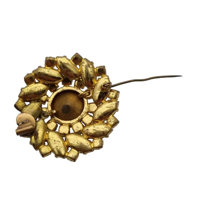 Broche vintage con pedrería verde destellos arcoíris original de los años