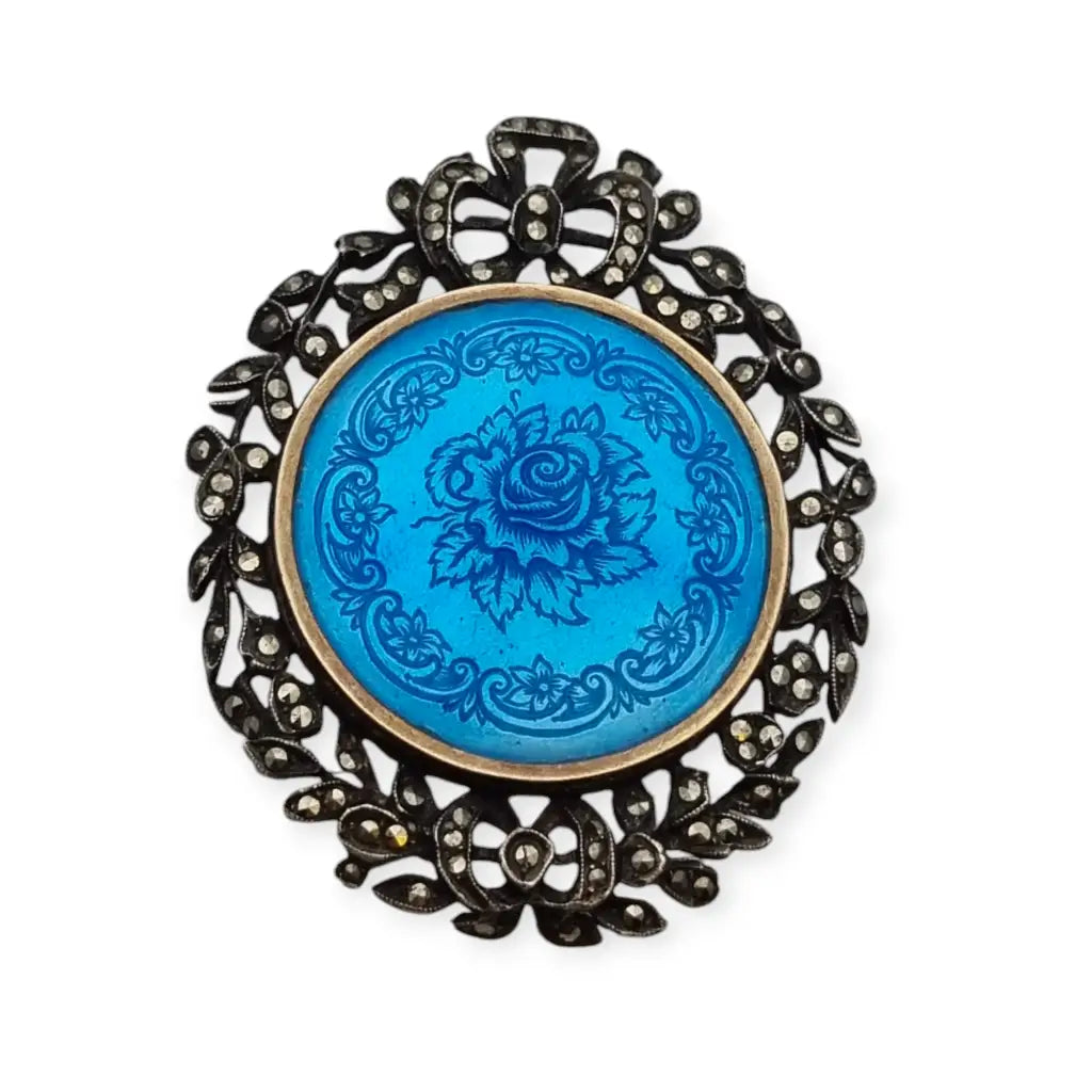 Broche de plata y esmalte azul con flores marquesitas estilo victoriano.