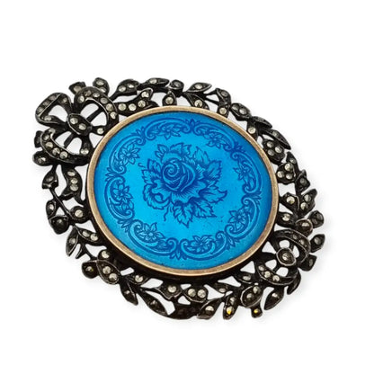 Broche de plata y esmalte azul con flores marquesitas estilo victoriano.