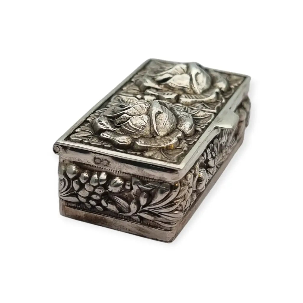 Caja de plata Inglesa la marca Ari D. Norman con rosas repujadas Londres