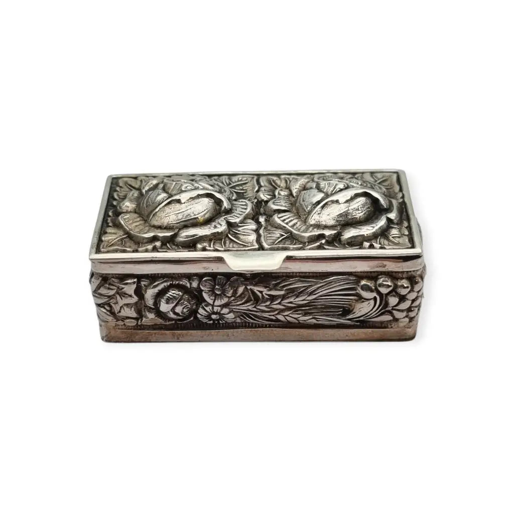 Caja de plata Inglesa la marca Ari D. Norman con rosas repujadas Londres