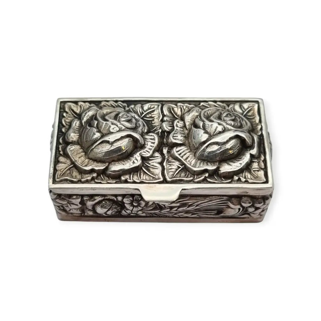 Caja de plata Inglesa la marca Ari D. Norman con rosas repujadas Londres