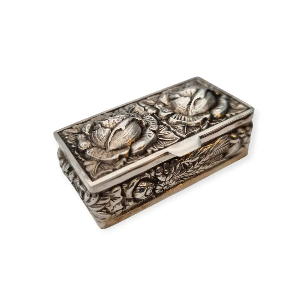 Caja de plata Inglesa la marca Ari D. Norman con rosas repujadas Londres