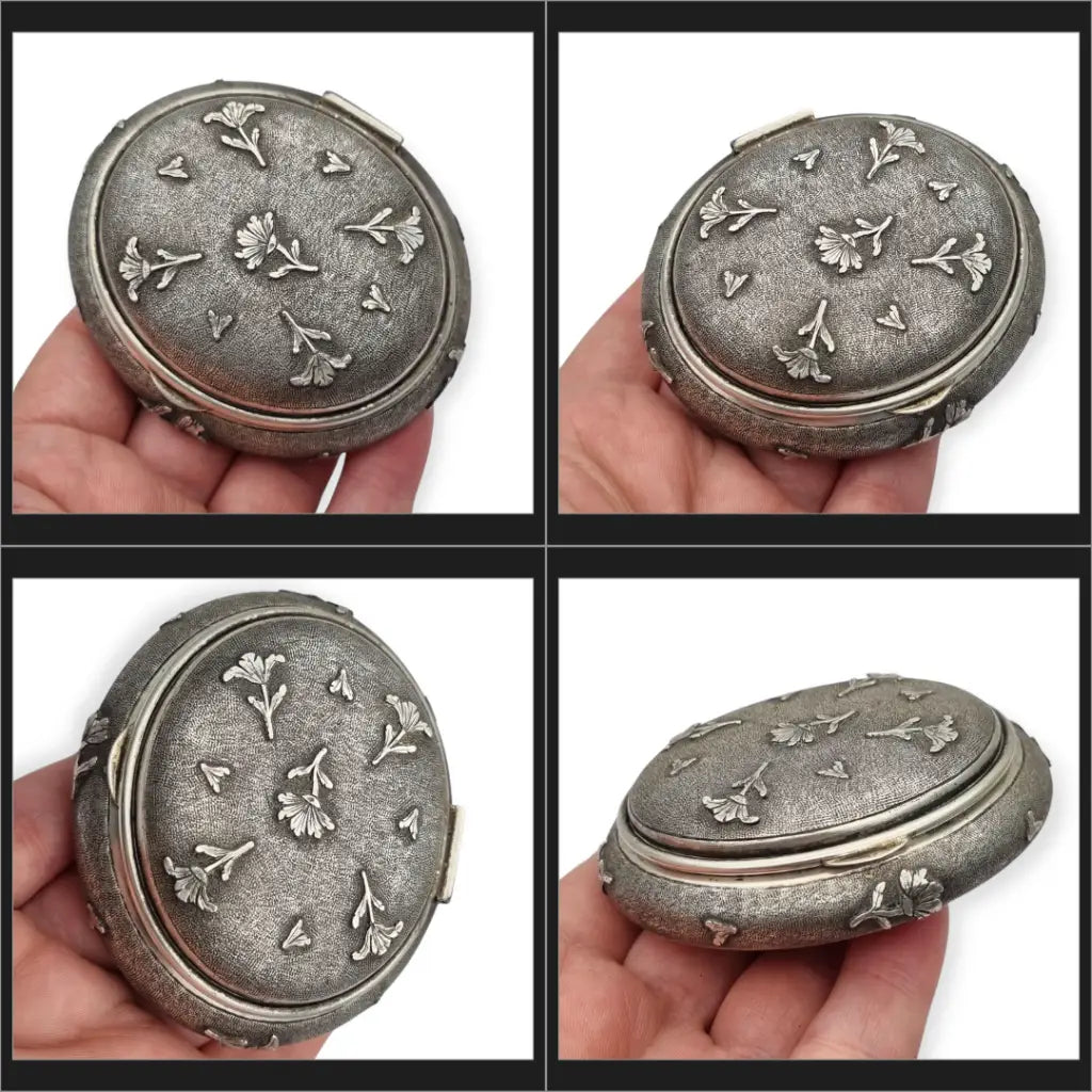 Caja vintage ovalada floral en relieve de plata italiana 800 firmada Mambretti
