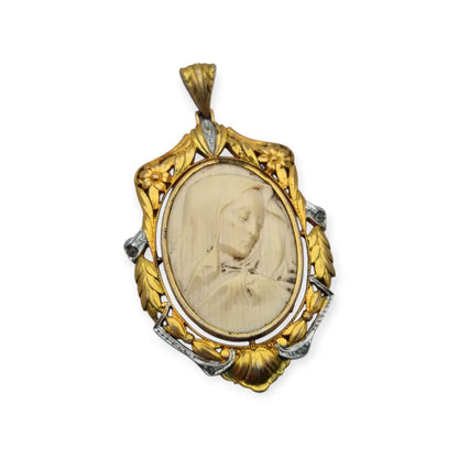 Colgante Art Nouveau de la Virgen década 1910 en celuloide y metal dorado