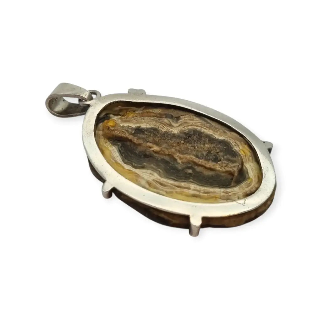Colgante boho vintage en plata con drusa natural ovalada,| Circa 1970.