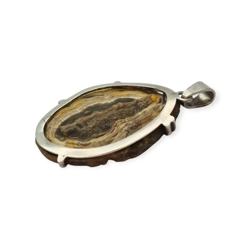 Colgante boho vintage en plata con drusa natural ovalada,| Circa 1970.