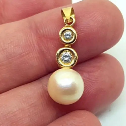 Colgante de oro con diamantes y perlas amarillo 18k joyas brillantes