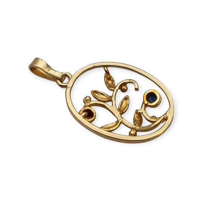 Colgante floral ovalado Oria en oro laminado con rubí azul y zafiro rosa –