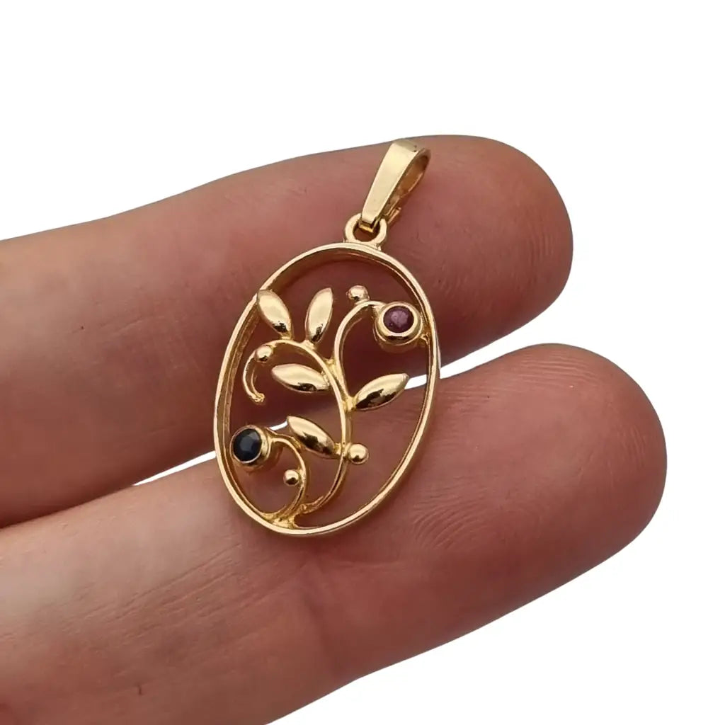 Colgante floral ovalado Oria en oro laminado con rubí azul y zafiro rosa –