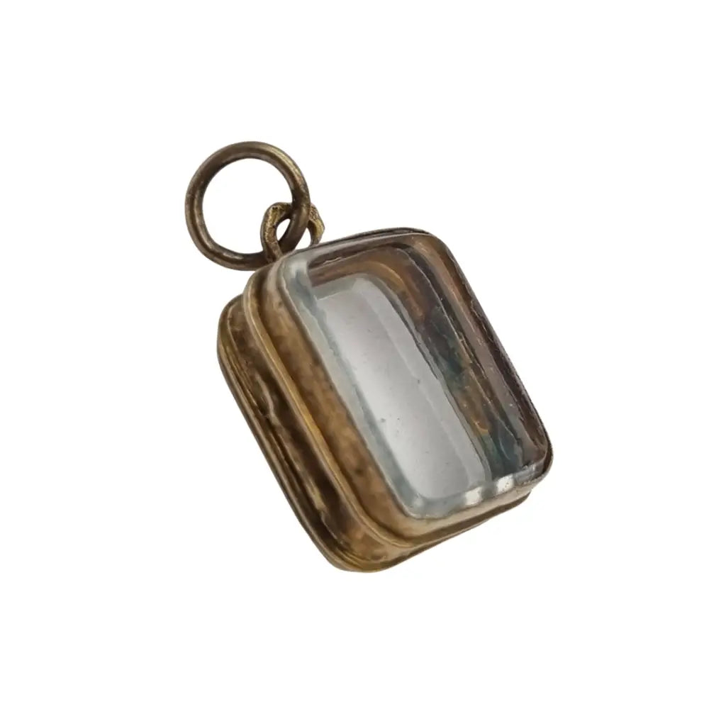 Colgante guardapelo antiguo rectangular doble cristal latón dorado siglo xix–xx.