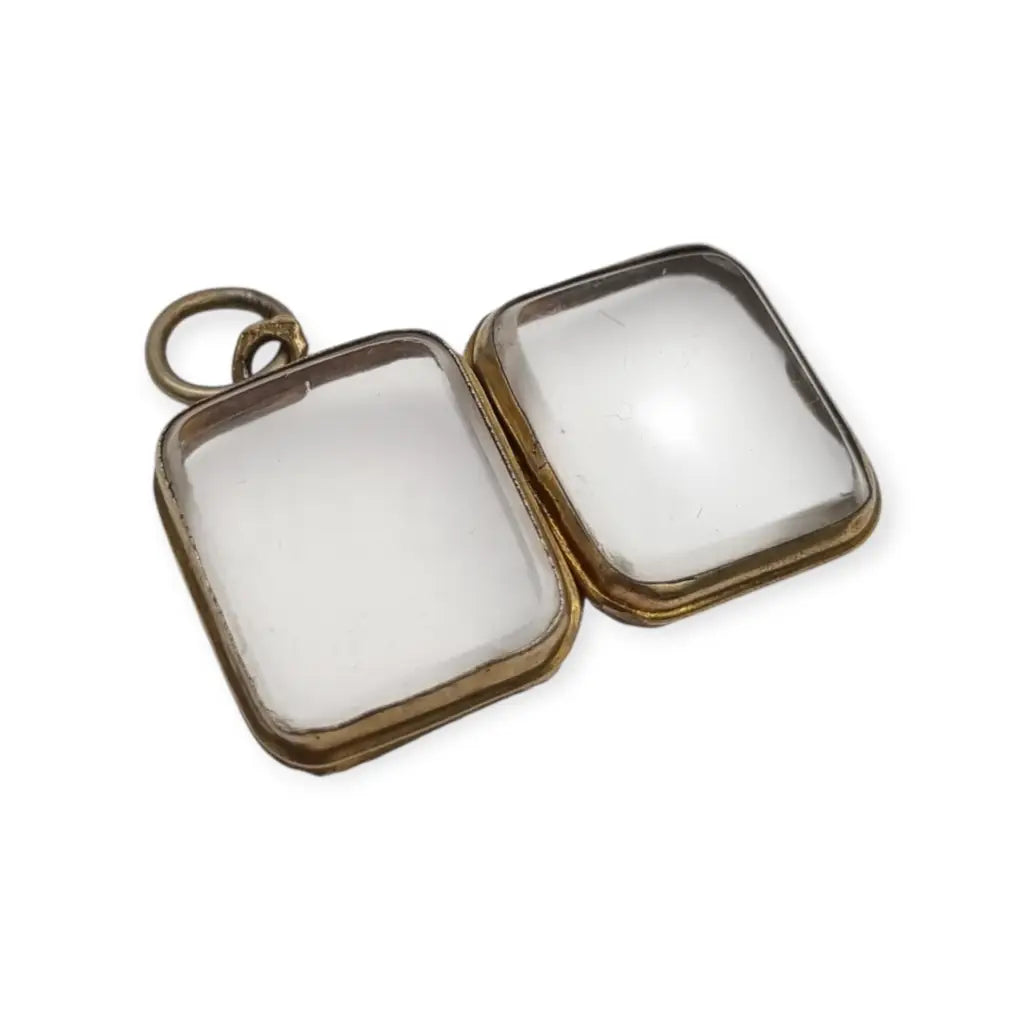 Colgante guardapelo antiguo rectangular doble cristal latón dorado siglo xix–xx.