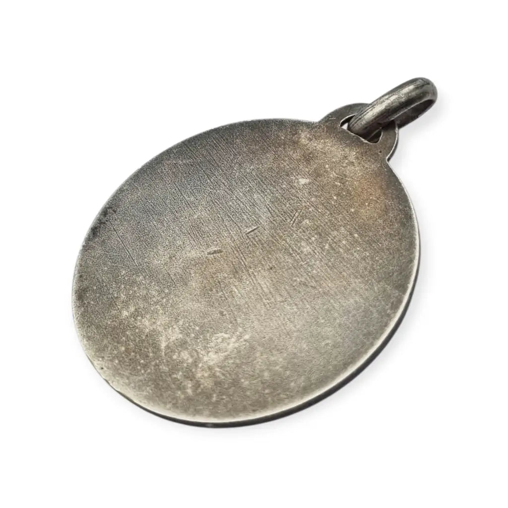 Colgante tipo medalla con perfil femenino inspiración grecorromana metal tono