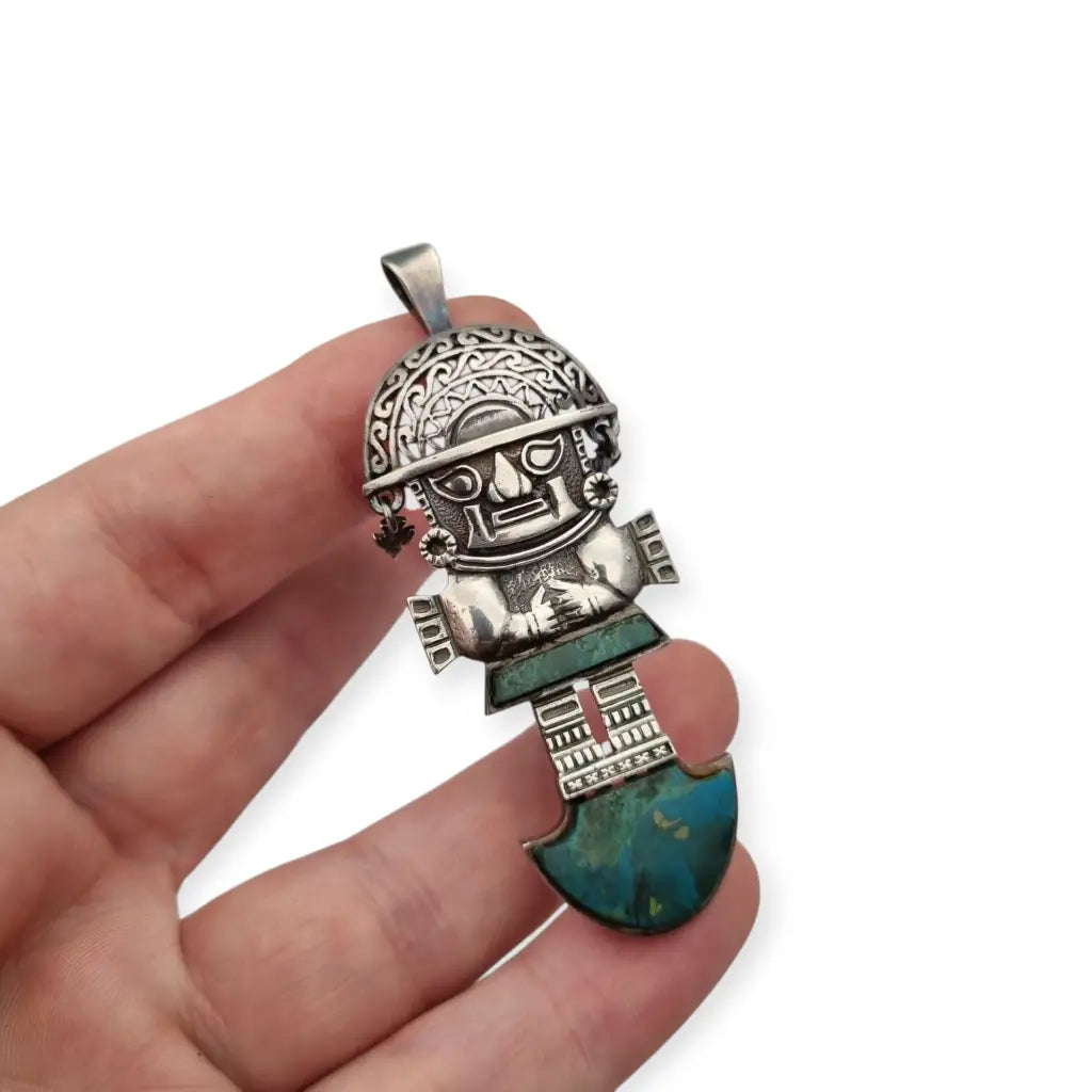 Colgante Tumi de plata y turquesa joyeria étnica peruana andina regalos boho.