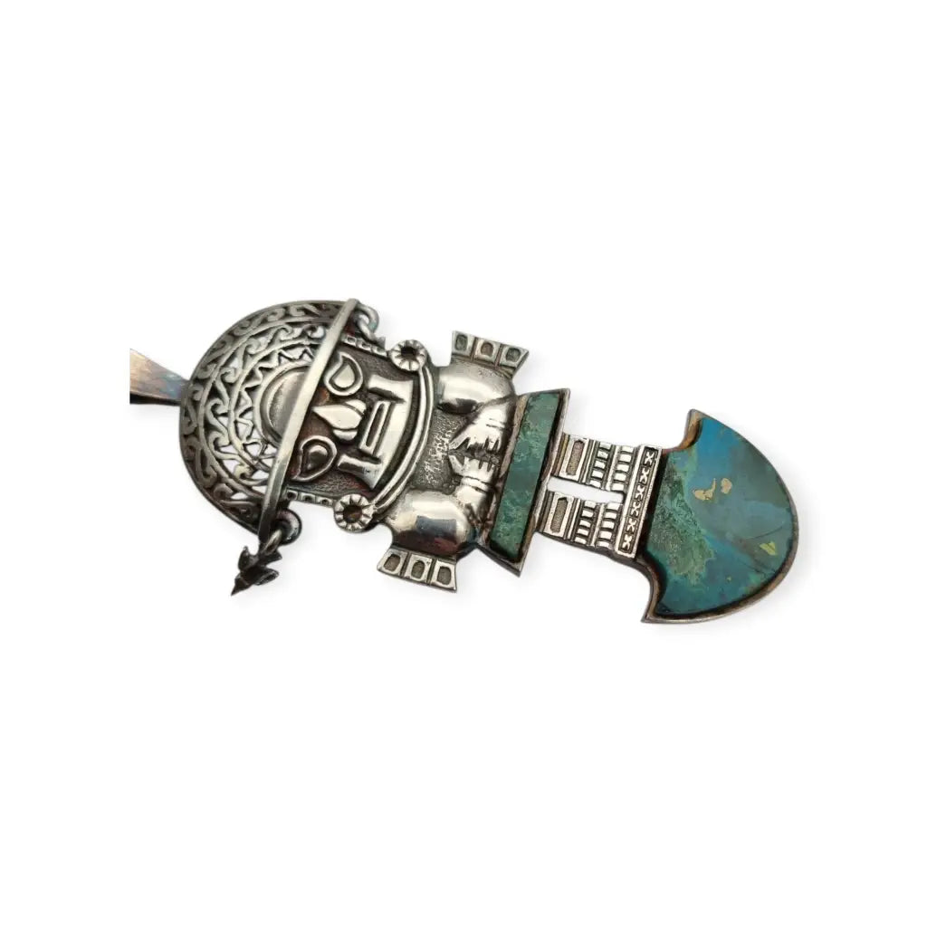 Colgante Tumi de plata y turquesa joyeria étnica peruana andina regalos boho.
