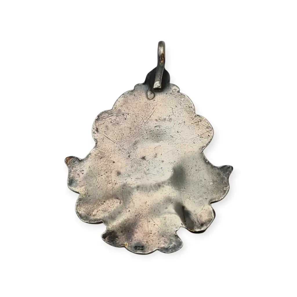 Colgante vintage de plata con baño dorado y símbolo tibetano piedra blanca