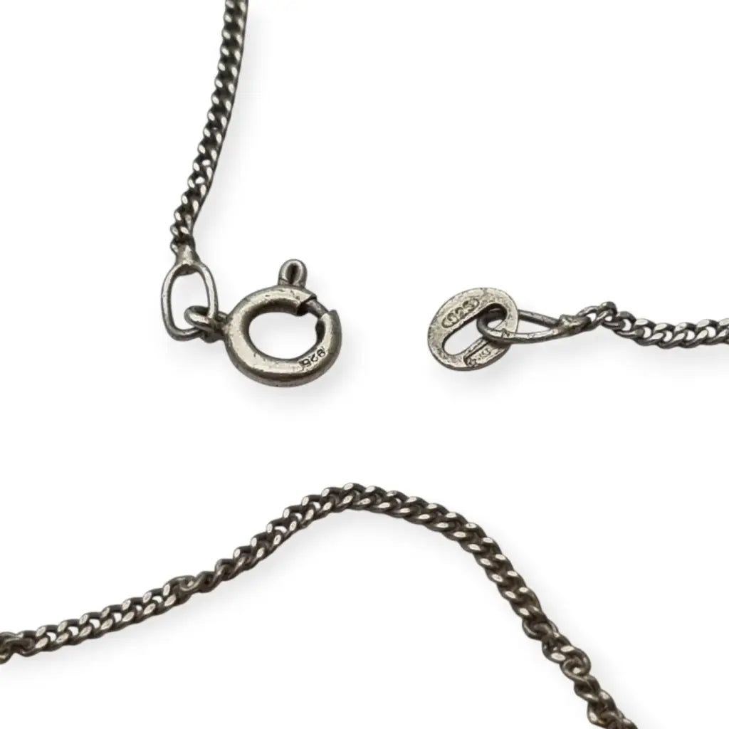 Colgante vintage de vieira jacobea en piedra negra y plata 925 Camino