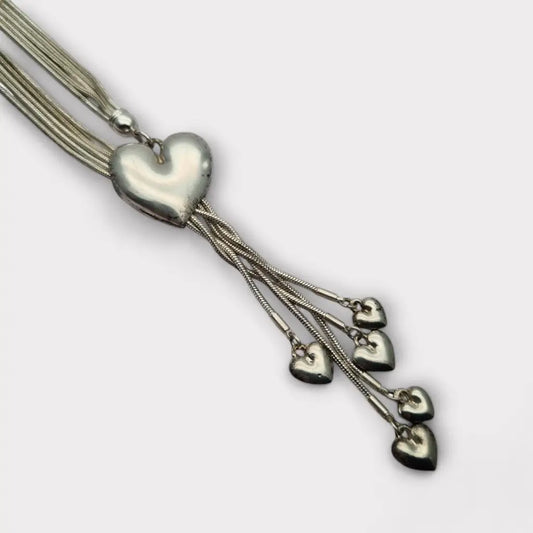 Collar largo vintage de metal plateado con forma corazón deslizante colgante