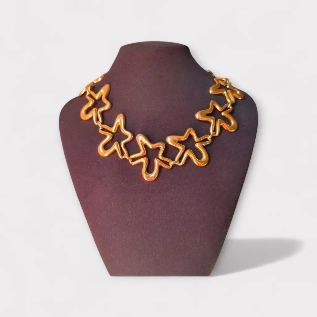 Collar vintage orena paris de los años 80 y 90 diseño estrella abstracta