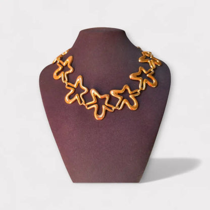 Collar vintage orena paris de los años 80 y 90 diseño estrella abstracta