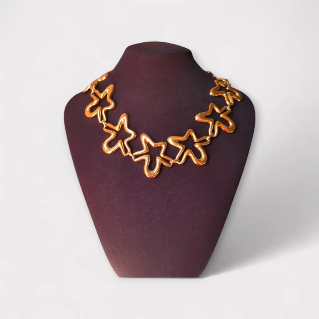 Collar vintage orena paris de los años 80 y 90 diseño estrella abstracta