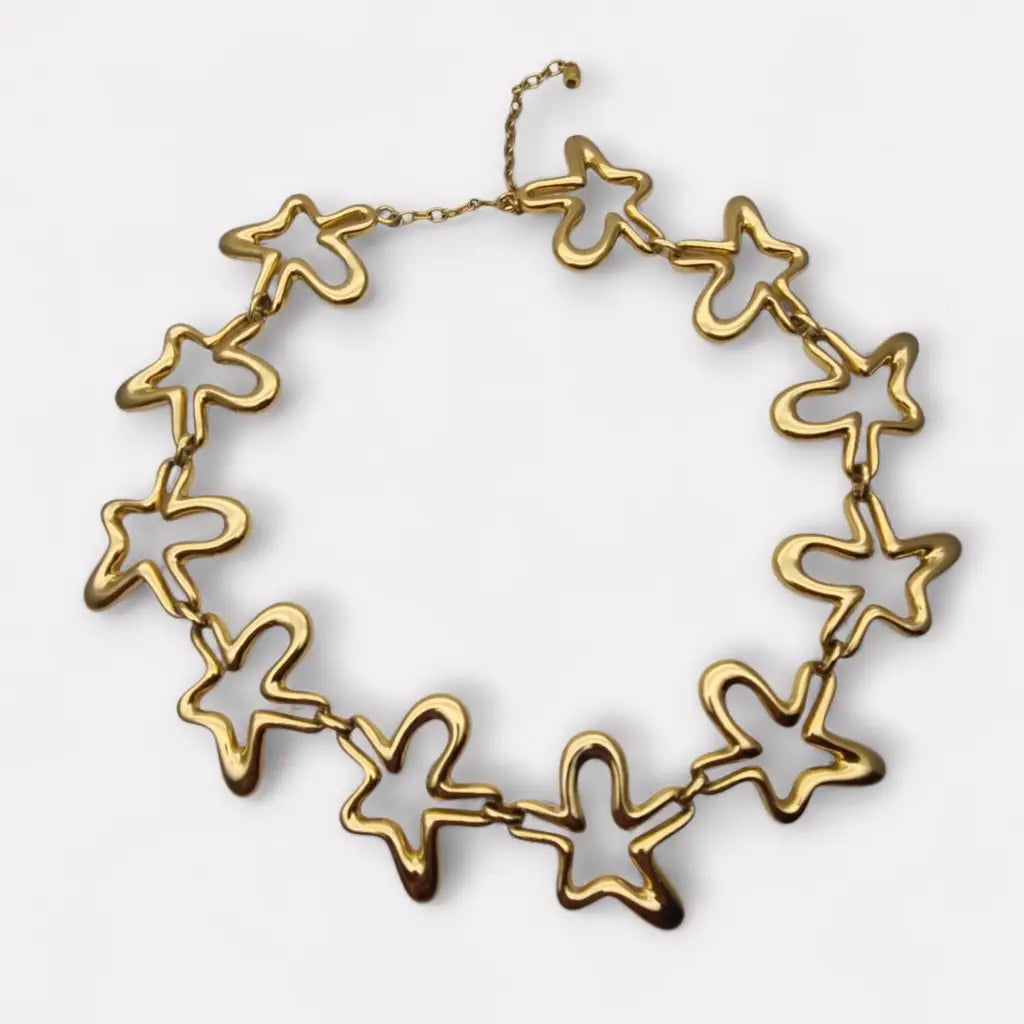 Collar vintage orena paris de los años 80 y 90 diseño estrella abstracta