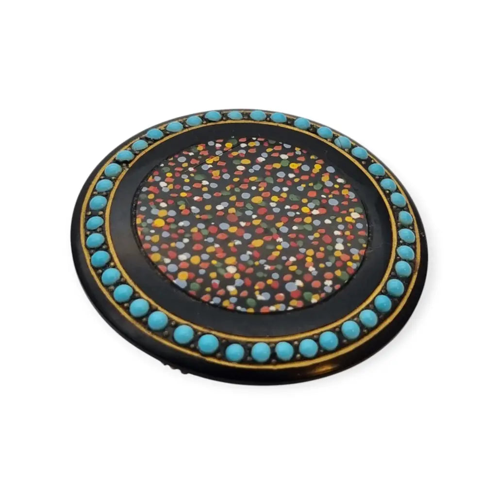 Colorido broche circular art déco con cuentas color azul turquesa década