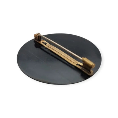 Colorido broche circular art déco con cuentas color azul turquesa década