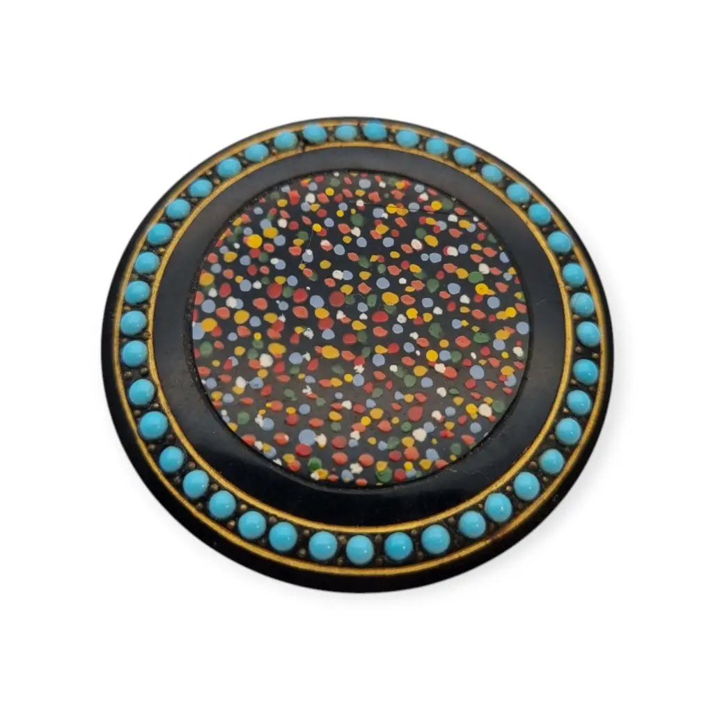 Colorido broche circular art déco con cuentas color azul turquesa década